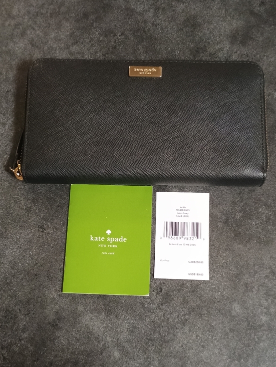 kate spade Handbags - Kate Spade Black Laurel Way Zip-Around Saffiano Continental Wallet